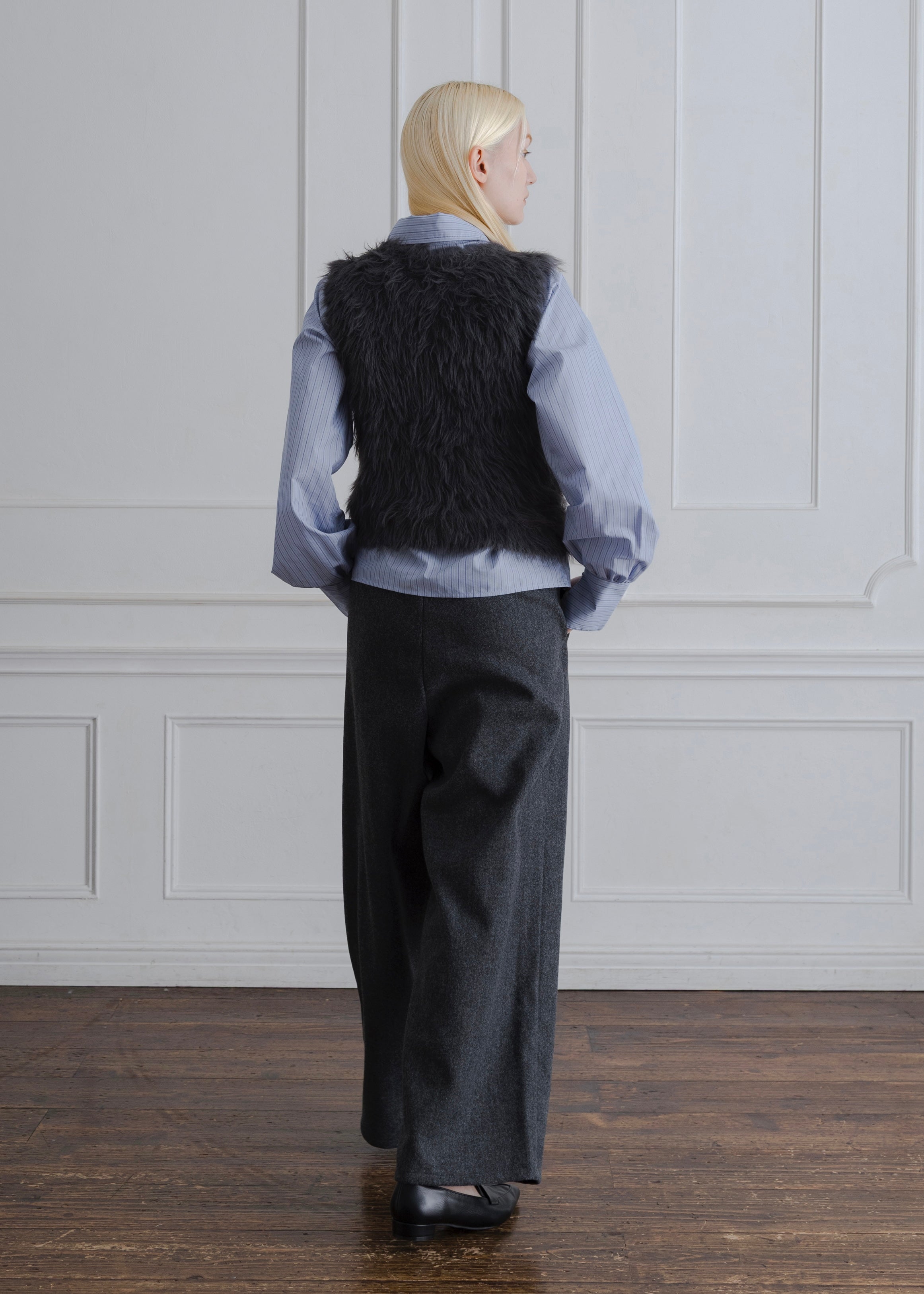 FEATHER VEST
