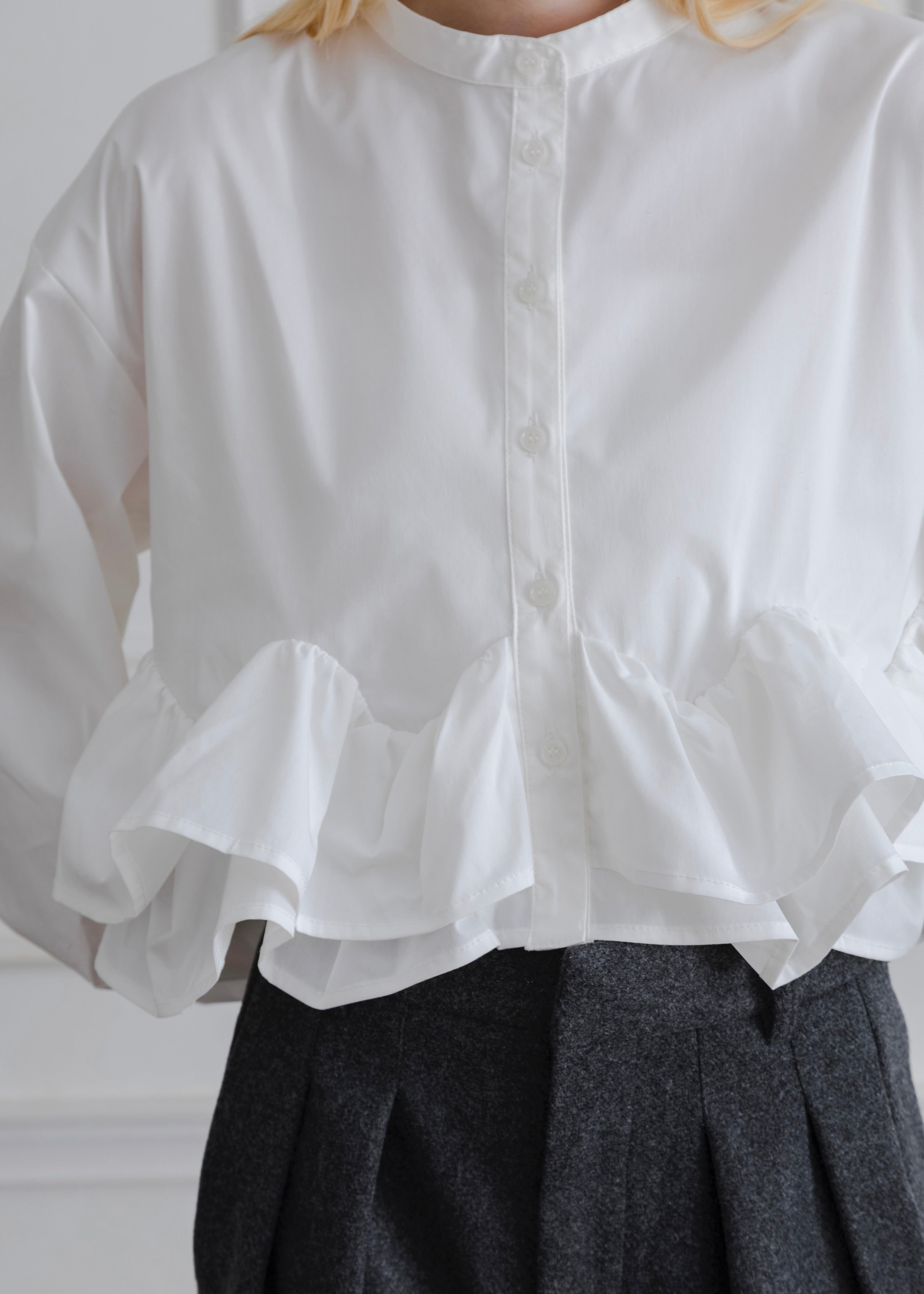 FRILL HEM BLOUSE