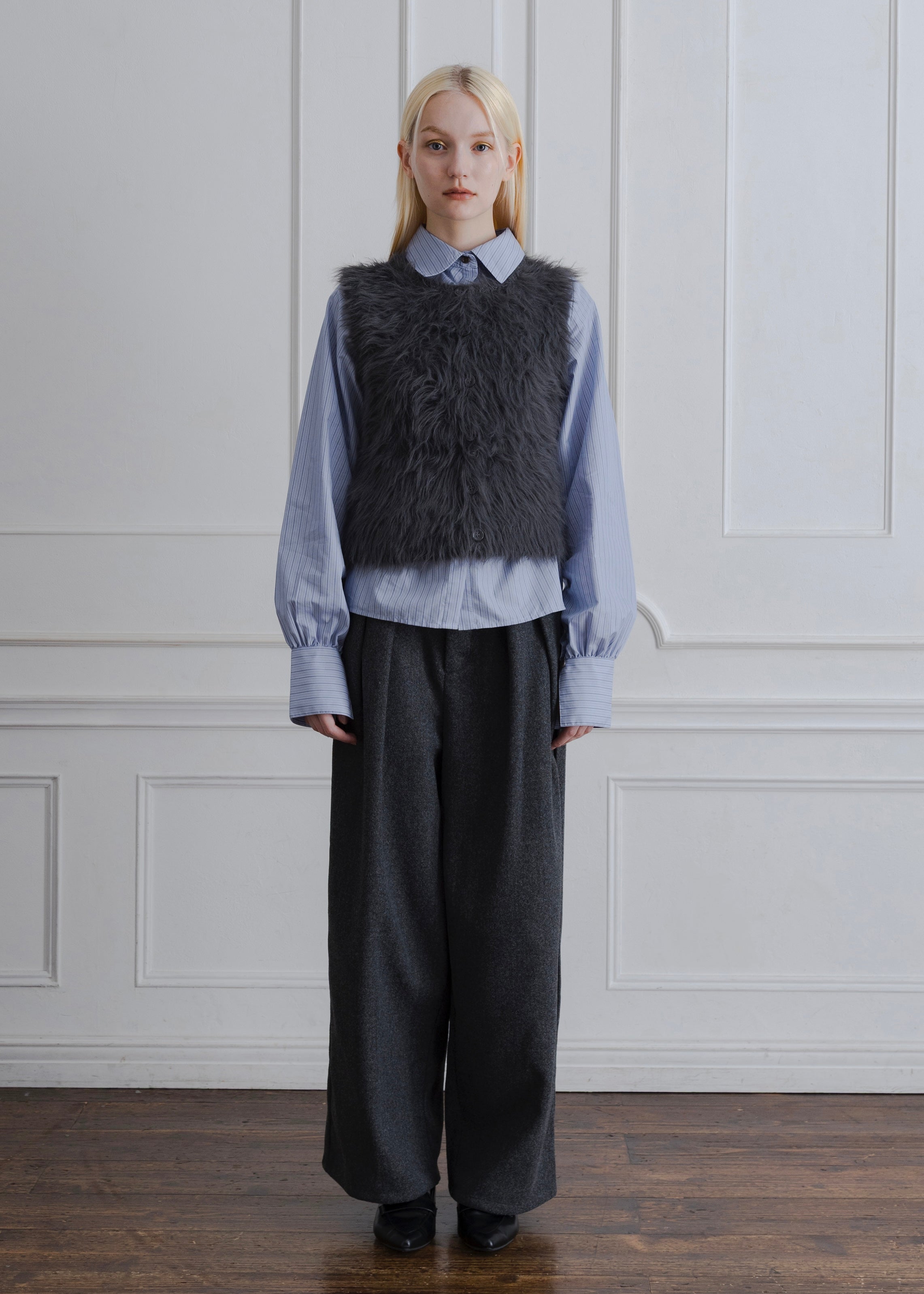 FEATHER VEST