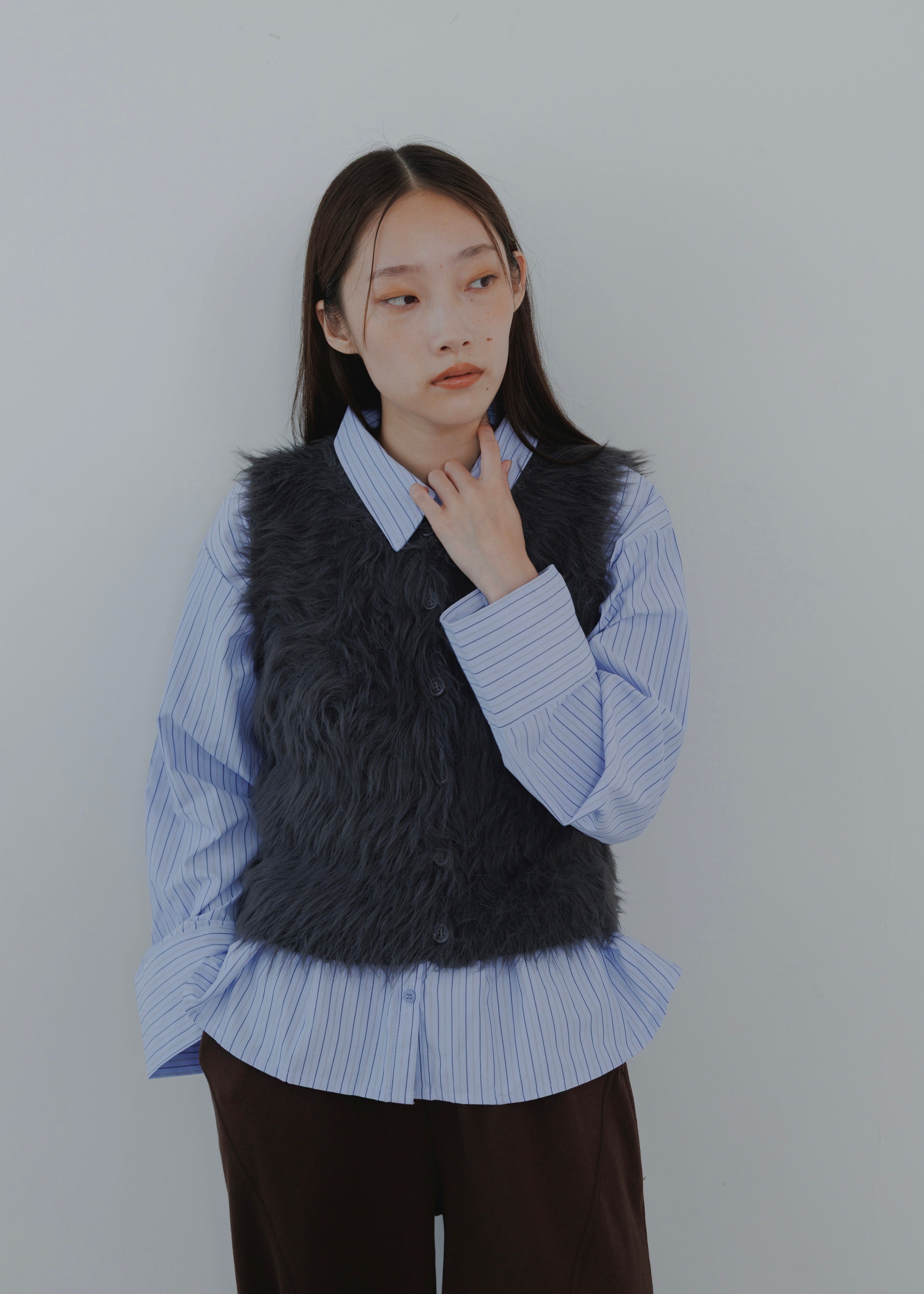 FEATHER VEST