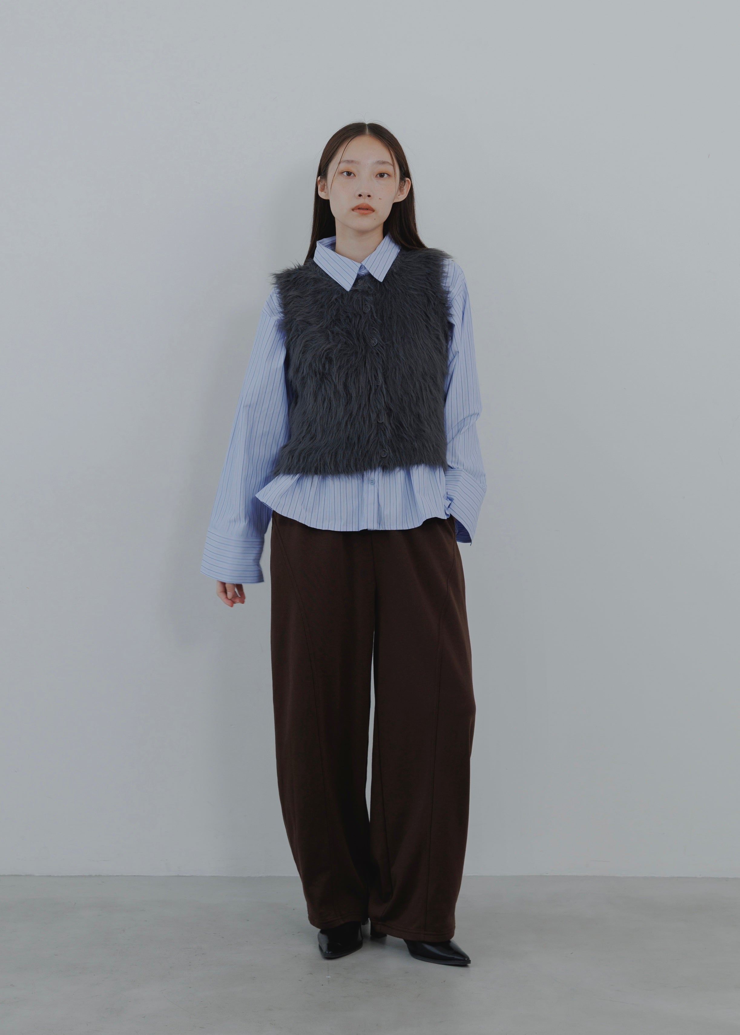 FEATHER VEST