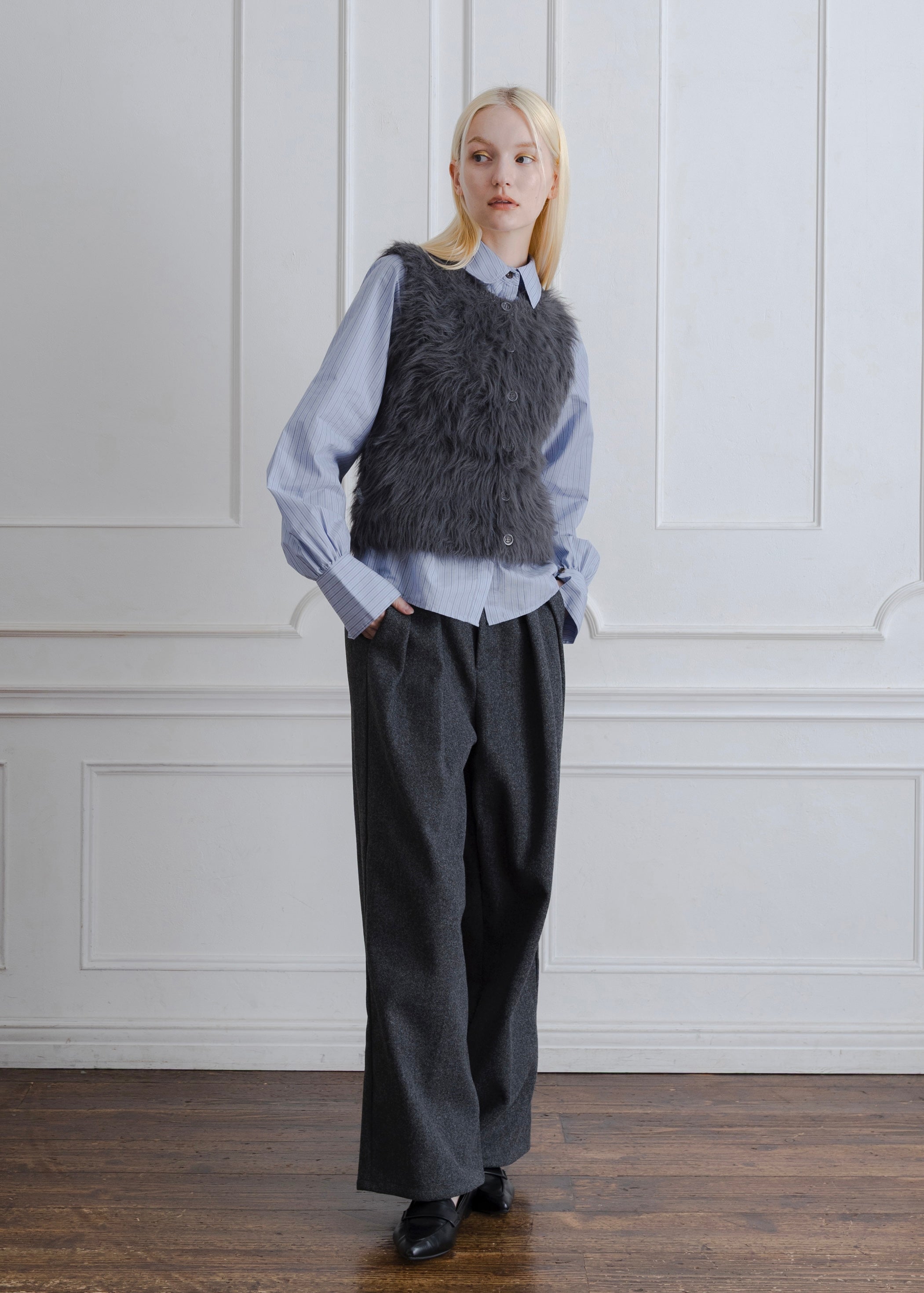 FEATHER VEST