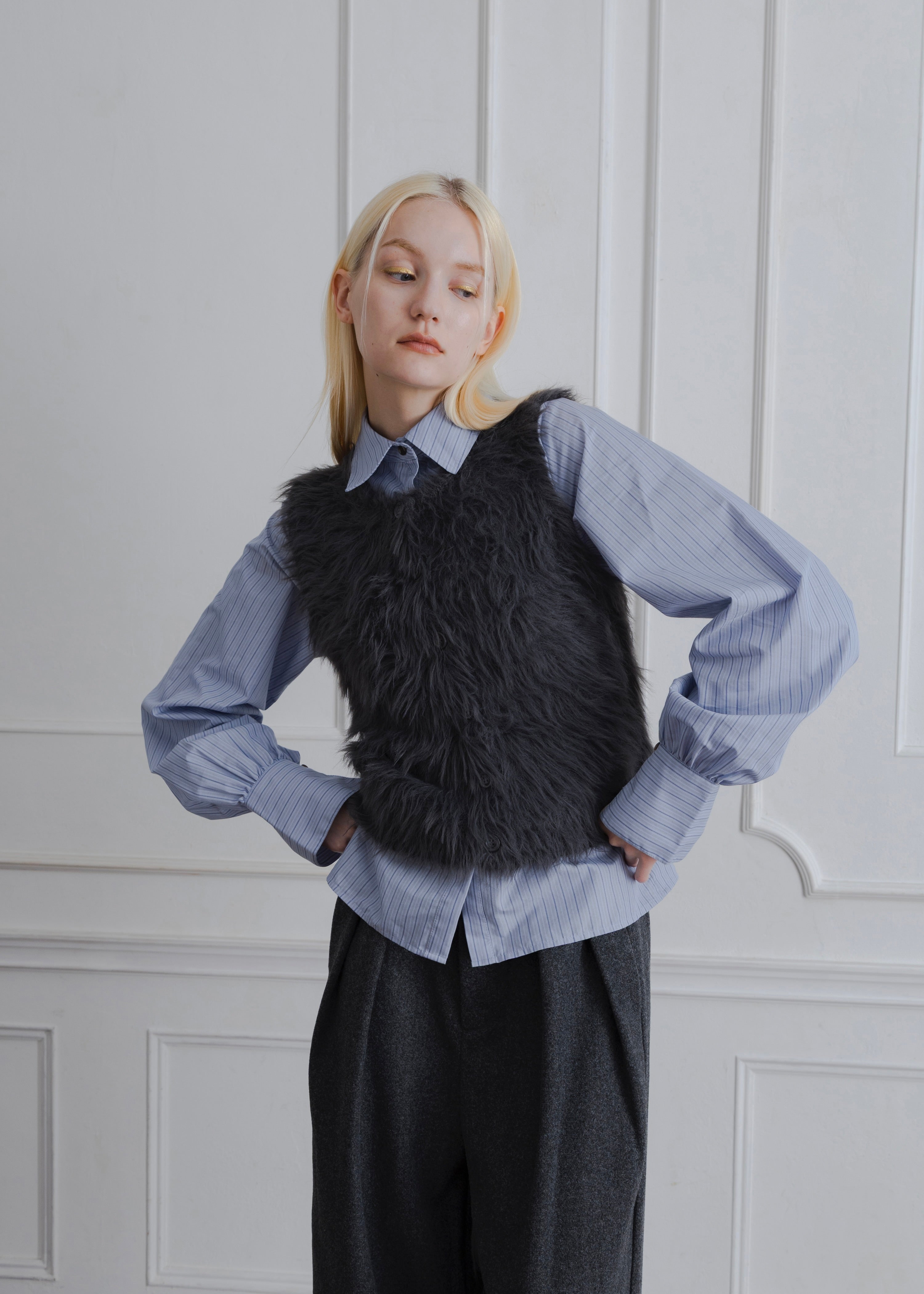 FEATHER VEST