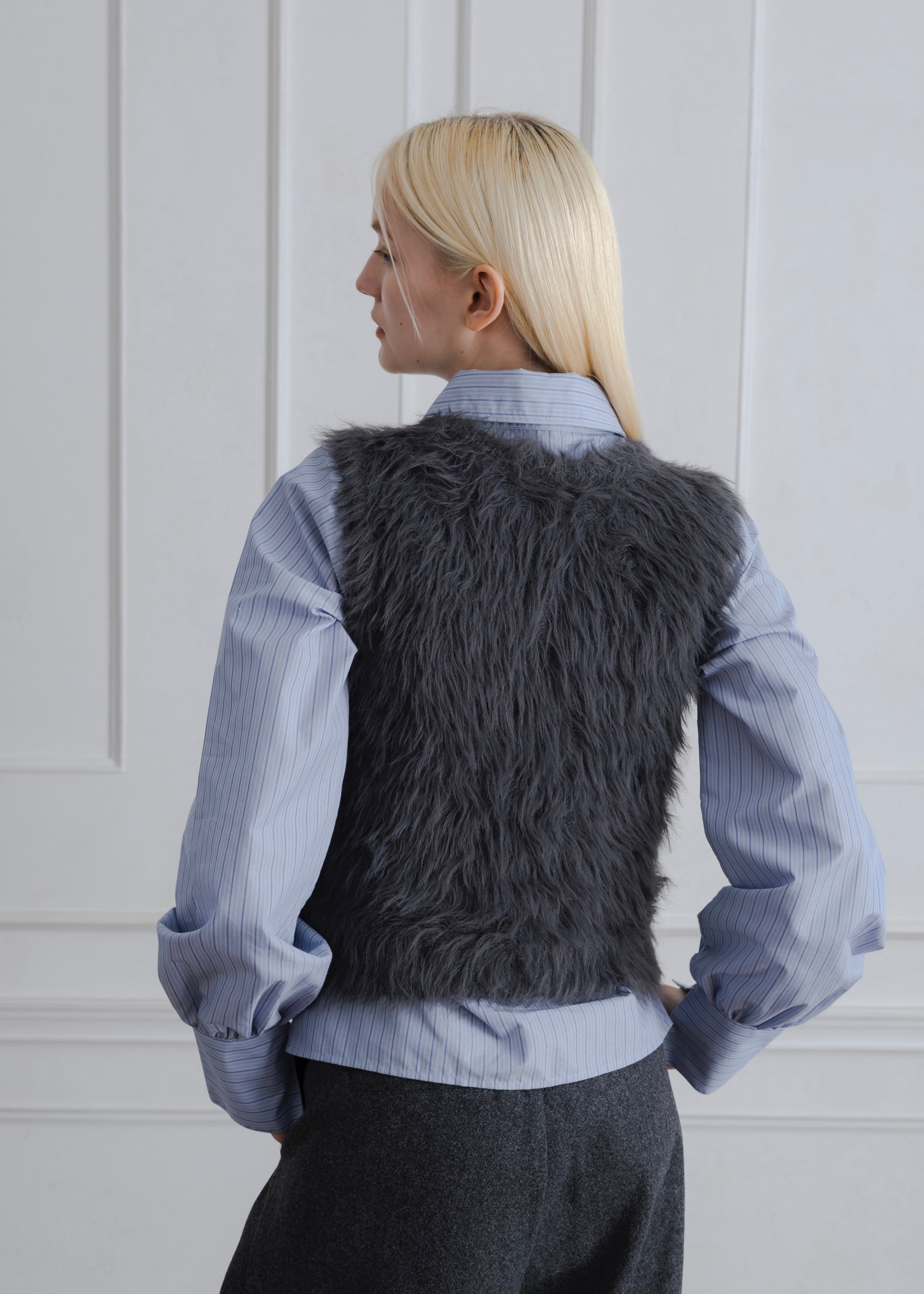 FEATHER VEST
