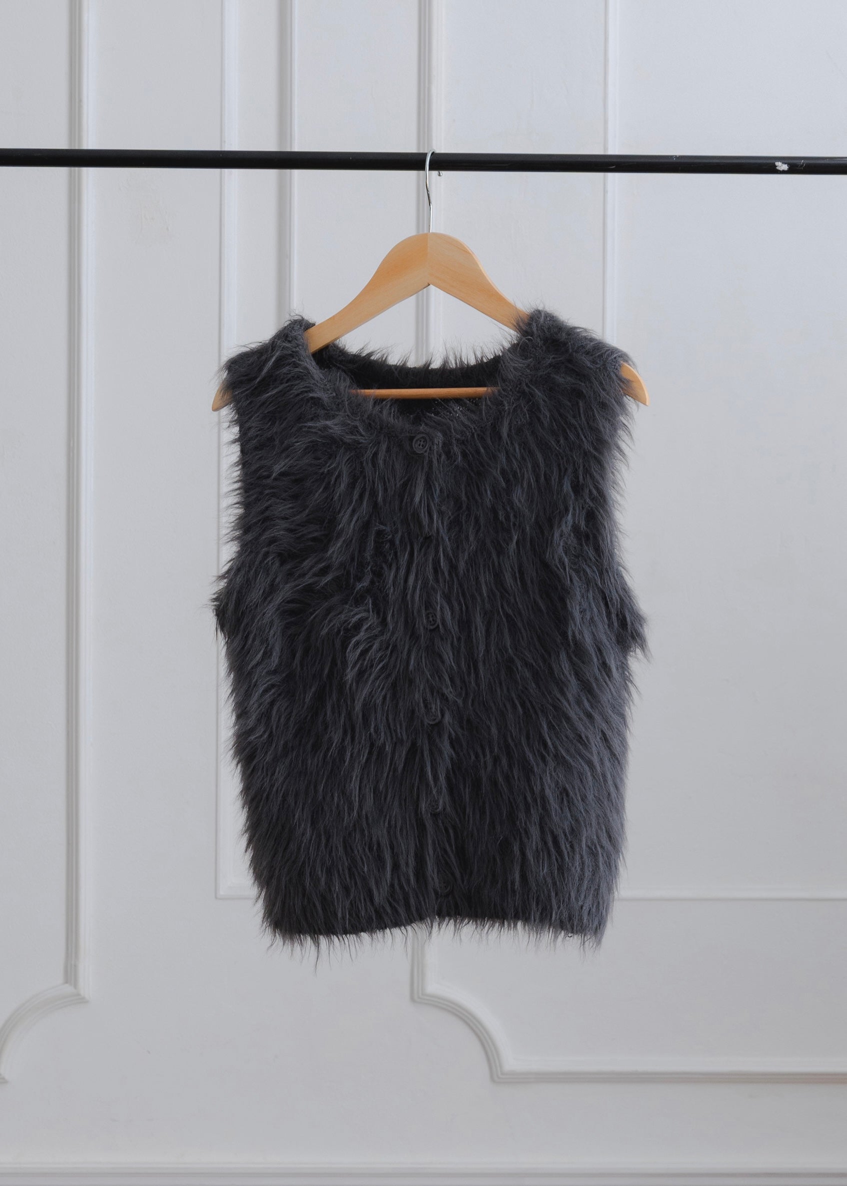 FEATHER VEST