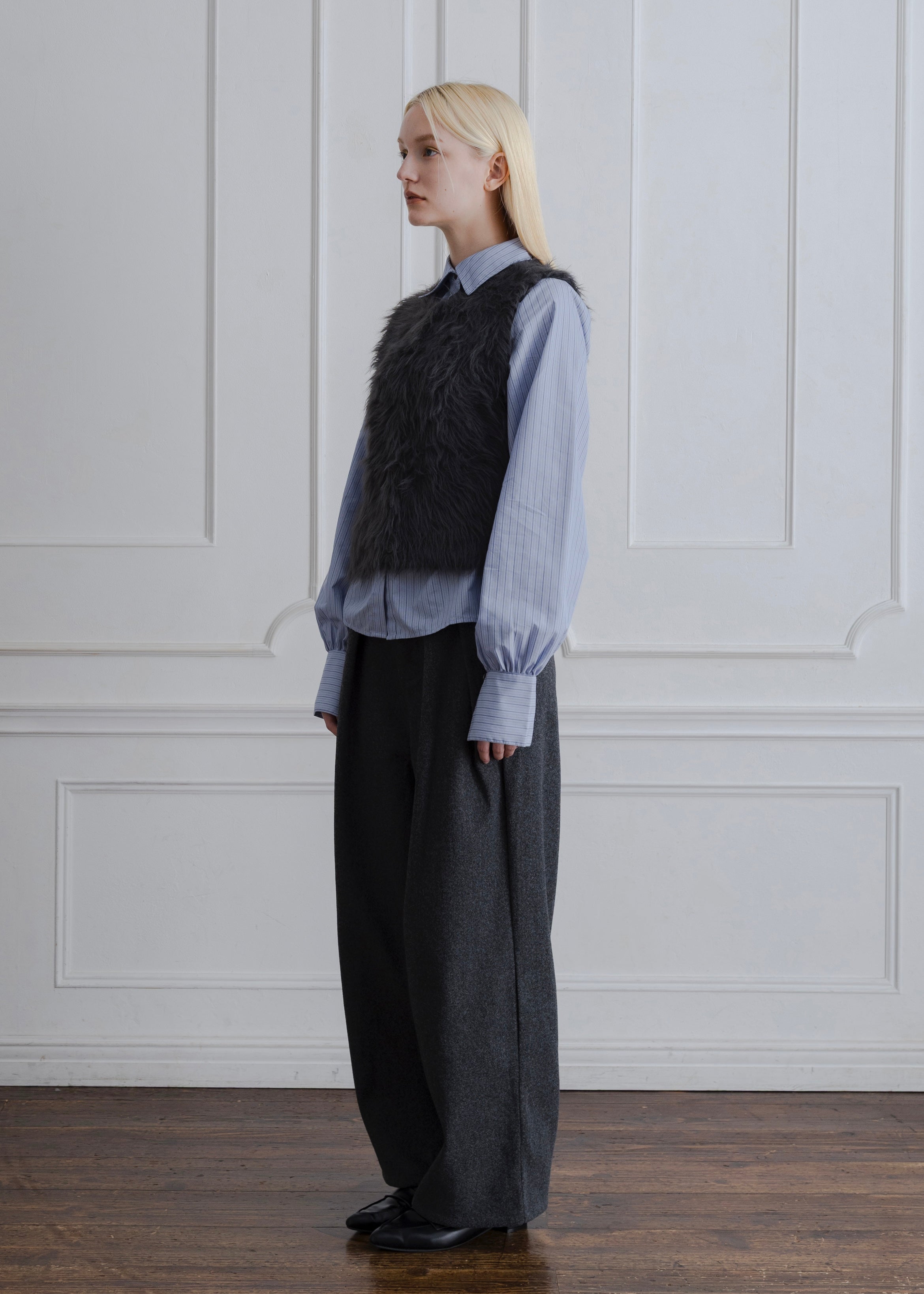 FEATHER VEST