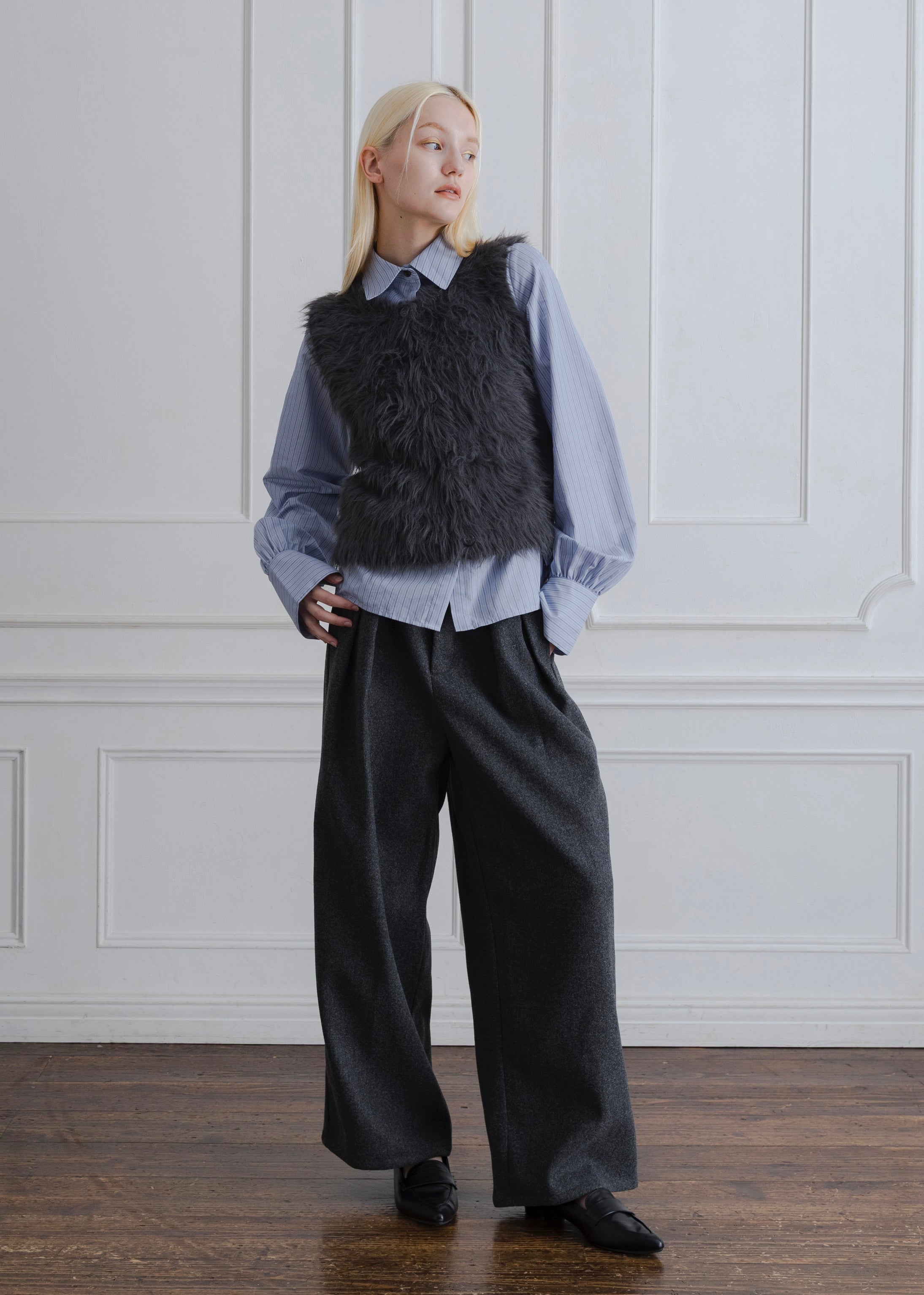 FEATHER VEST