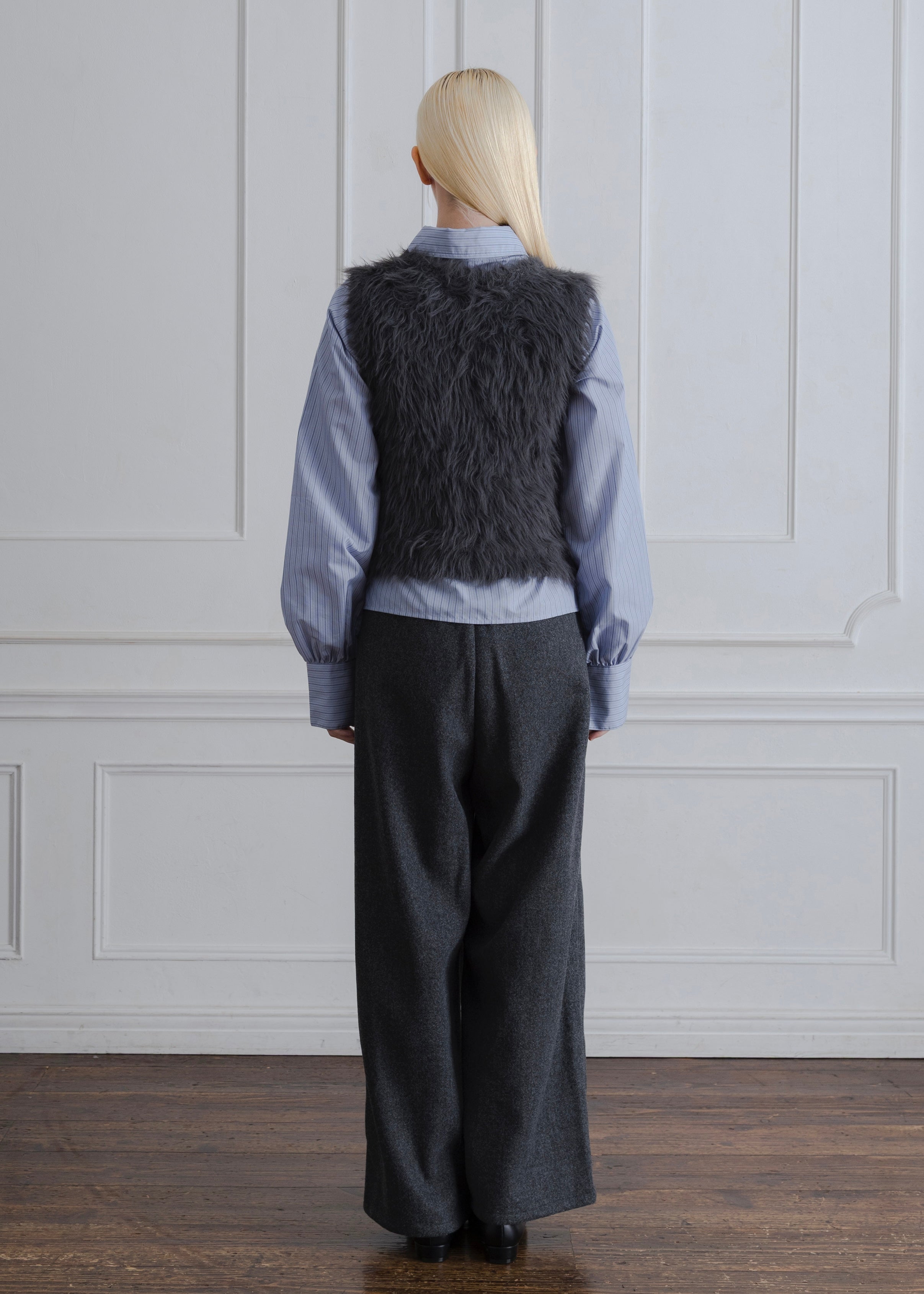FEATHER VEST